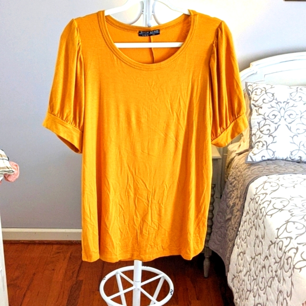 Botique stretch Tee with bubble sleeve.